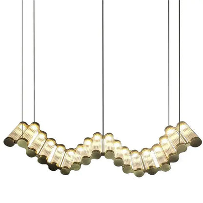 A modern curved pendant light with warm ribbed glass tubes in black cords for living room decorbites golden chandelier