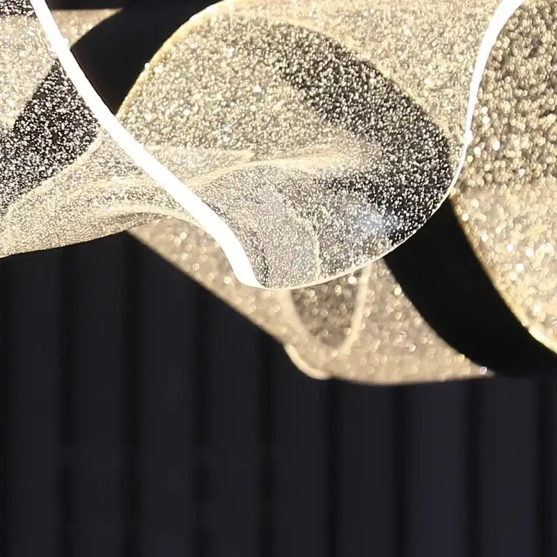 Modern wave glass elegant led pendant chandelier features a translucent glittering gold leaf pendant with white outline