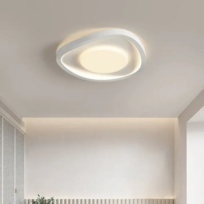 Modern wavy cream style led ceiling lamp with oval design and soft ambient glow for living room decorbites cream style