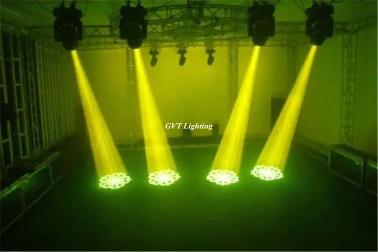 Five bright yellow 150w gobo led moving head spotlights mounted on a truss casting focused beams on stage