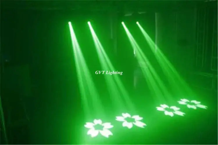 Modern white 150w gobo led moving head projecting green laser flower patterns on dark floor for event space lighting