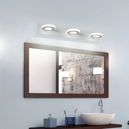 Modern white 3-light adjustable wall light fixture with circular LED bulbs on a sleek minimalist bathroom wall light fixture