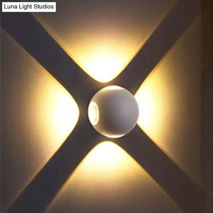 Modern white 4 light dome wall sconce with warm-toned spherical design emitting soft golden light 110v-120v