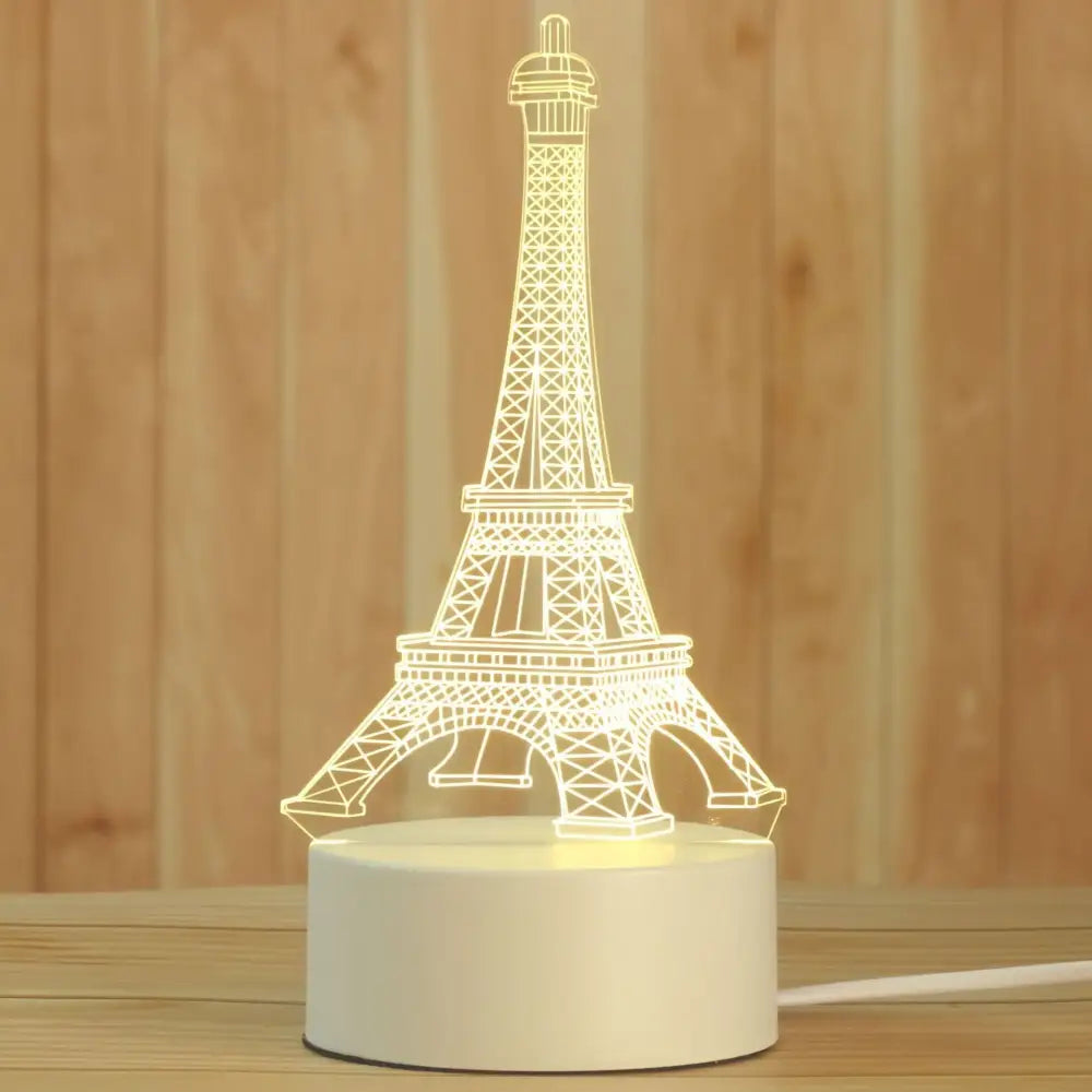 Modern white acrylic night lamp featuring a glowing eiffel tower 3d illusion on a sleek minimalist base decorbites 3d acrylic