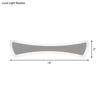 Gray 16-inch lumbar support cushion with white border paired with modern white acrylic wall sconce lighting 220v-240v 110v-120v