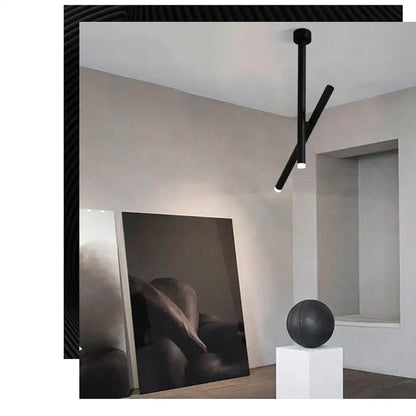 Black minimalist ceiling spotlights with two intersecting adjustable double angle cylindrical arms for modern decorbites lighting