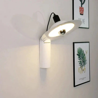 Modern white wall sconce reading lamp with sleek adjustable head for bedroom wall mounting and focused lighting