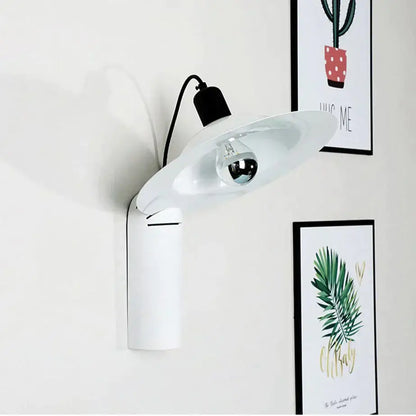 Modern white adjustable wall sconce with a sleek curved shade and visible bulb for bedroom reading use
