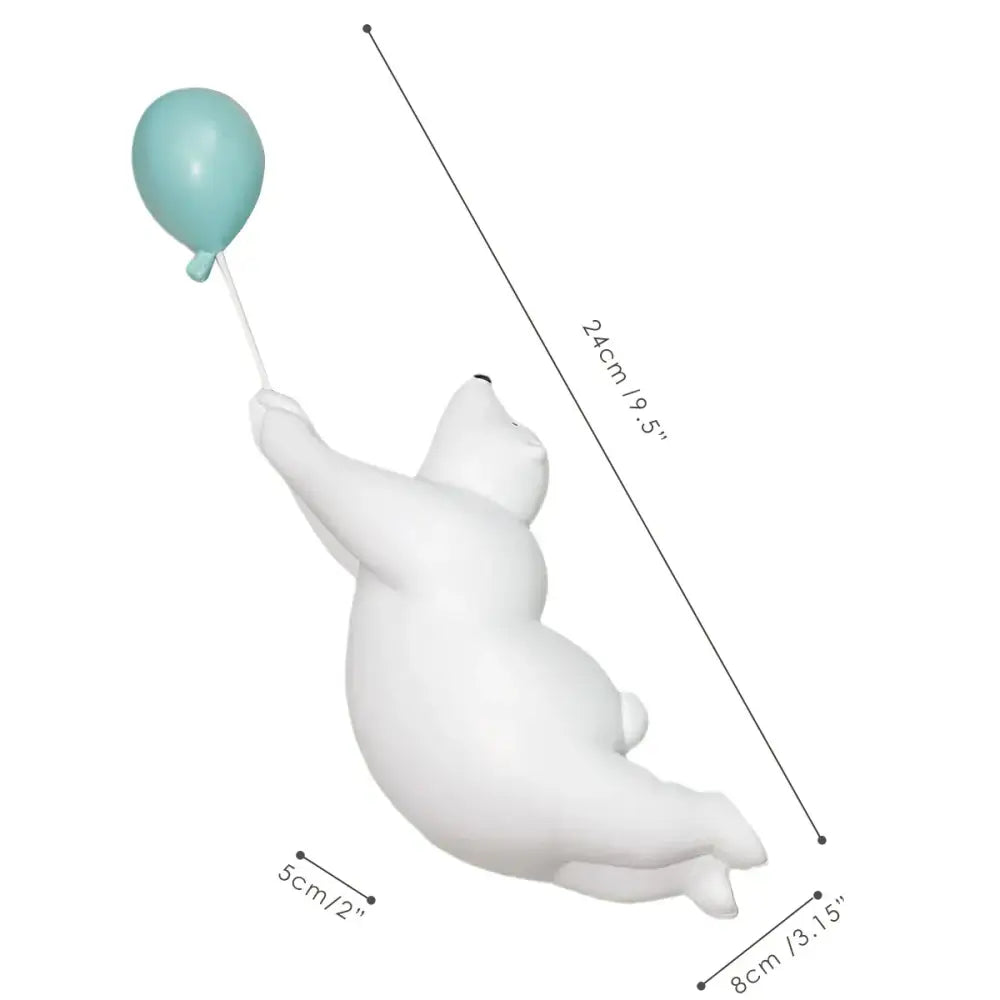 Modern white and blue flying bear balloon figurine featuring a white polar bear holding a light blue bear balloon decorbites design