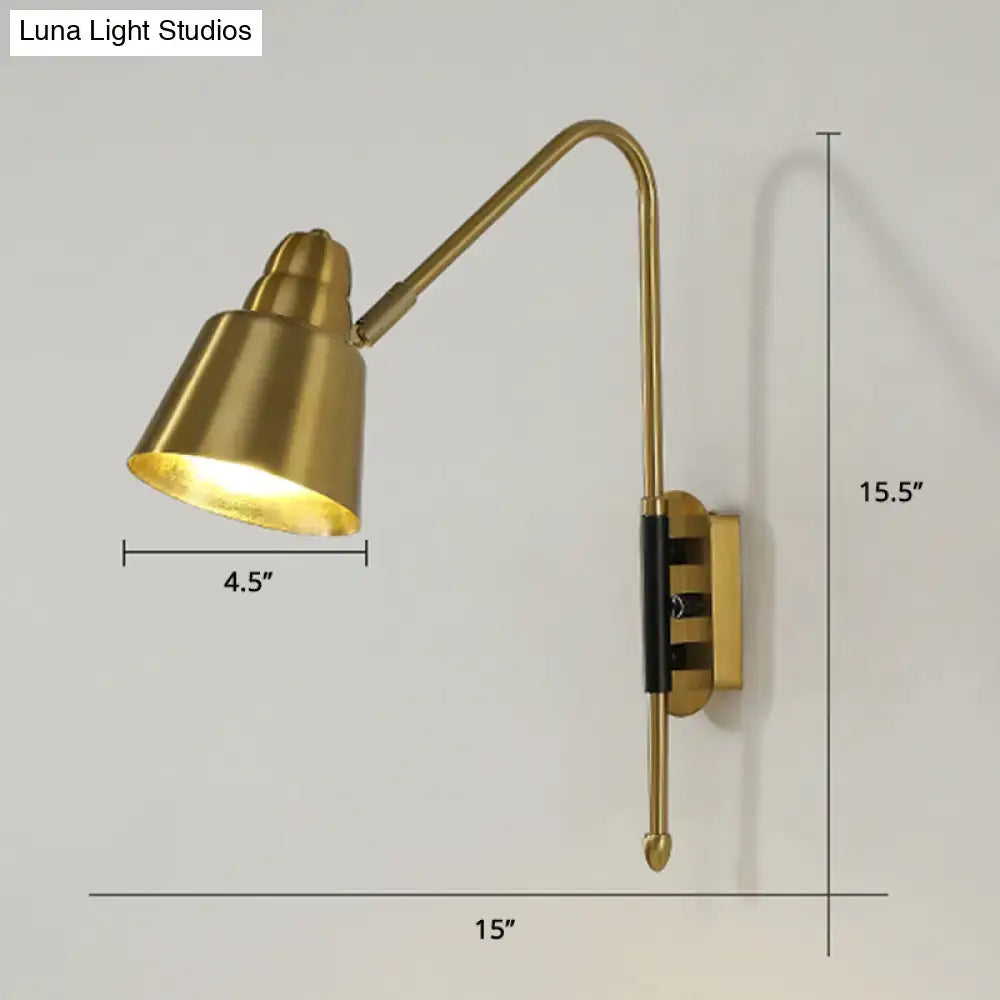 Modern white and brass v-shaped wall light with brass-finished adjustable arm and black accent band light type for reading
