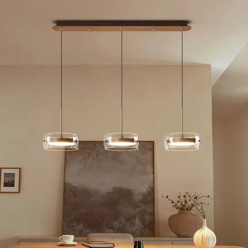 Modern white and clear glass ring pendant light with three glass shades and wooden bar for dining room with remote dimming
