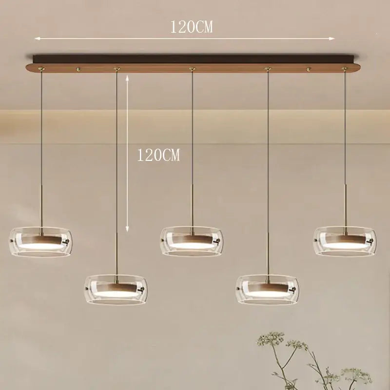 Modern white pendant light with clear glass shades and wooden bar featuring remote dimming for dining room use