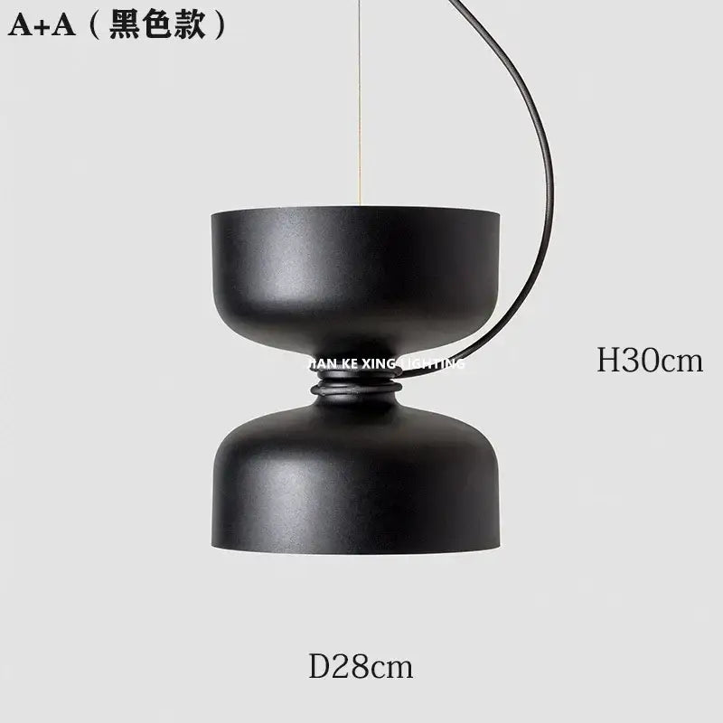 Black matte pendant light with two stacked bowls in a modern design for dining room decorbites designer iron chandelier