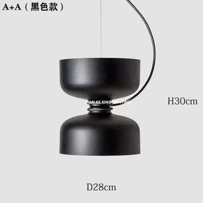 Black matte pendant light with two stacked bowls in a modern design for dining room decorbites designer iron chandelier