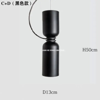Black matte pendant light with a sleek modern design featured in modern white and copper ceramic dining room decorbites designer iron chandelier