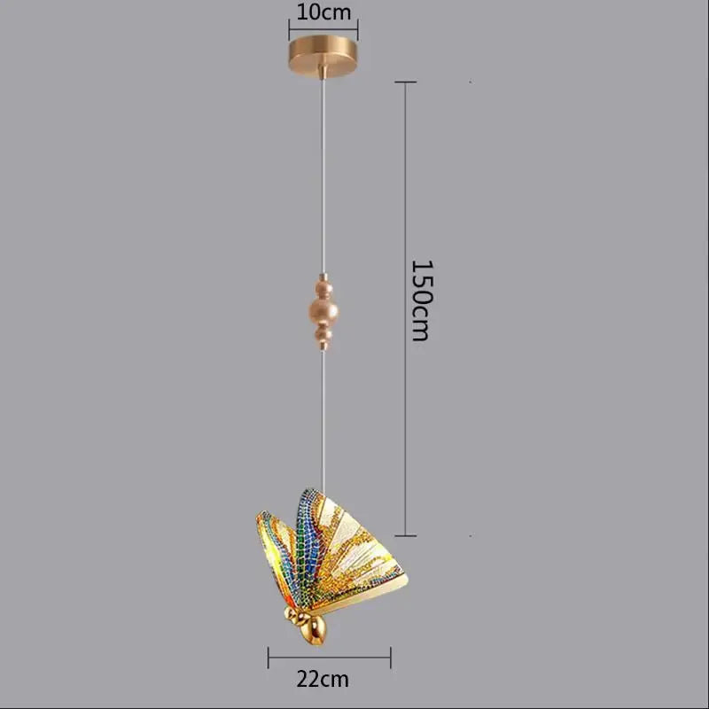 Modern white and gold butterfly pendant lights featuring a decorative golden butterfly pendant light with iridescent gemstone wings and brass ceiling mount for bedroom decorbites butterfly pendant lights