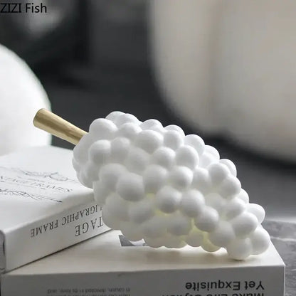 Modern white and gold ceramic grape skewer desk ornament featuring a gold-colored stem for dining room decorbites decor