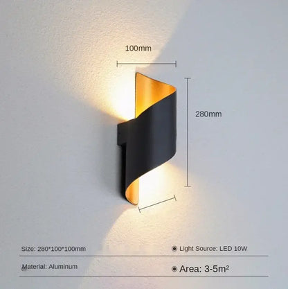 Modern black and gold aluminum outdoor wall lamp with a sleek twisted design for patio use