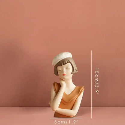 Delicate ceramic balloon girl bust tray in white and tan featuring a woman with closed eyes and a white beret