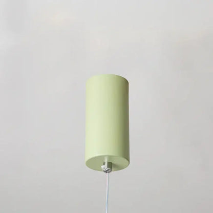 Modern white bead nordic chandelier featuring a sleek pale green cylindrical pendant light with metallic hardware