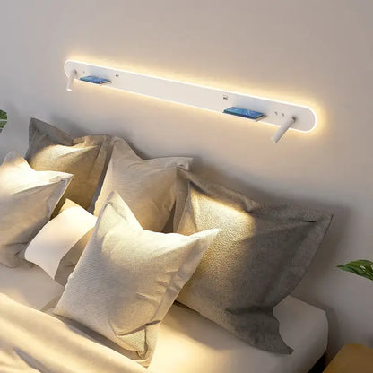Modern white bedside wall lamp with led headboard light and integrated phone charging slots for bedroom use