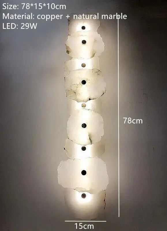 Modern white and black alabaster wall lamp with stacked marble and copper accents by decorbites brass for luxury decor