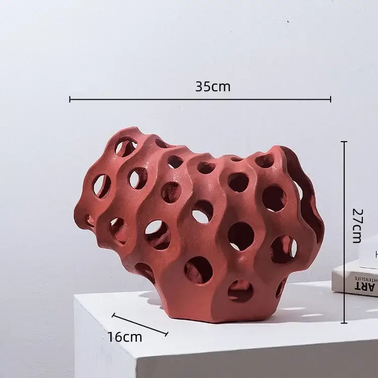 Modern white and black coral geometric resin sculpture with terracotta textured honeycomb ceramic pattern for living room decor