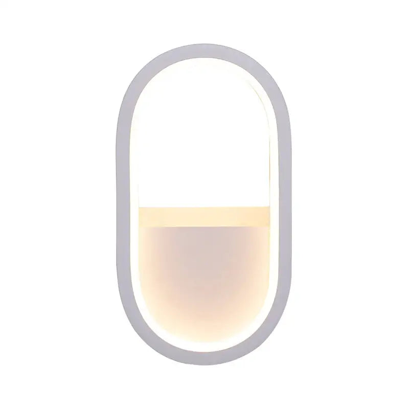 Modern white and black ellipse led wall lamp with a sleek gray frame and warm white light for bedroom use