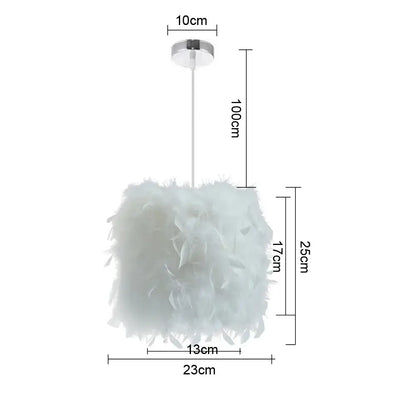 Modern white feather pendant light with cylindrical shade and chrome ceiling mount for bedroom cloud design