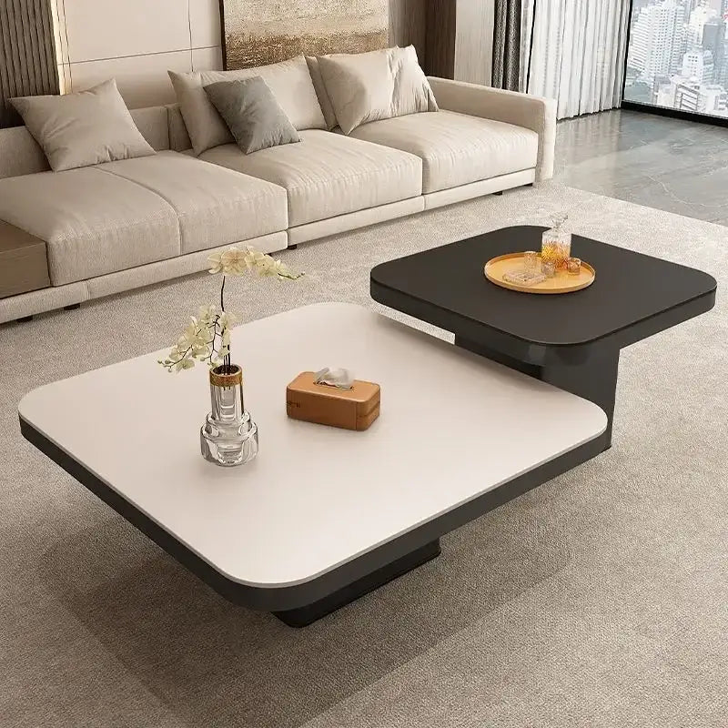 Modern two-tier luxury rock square coffee table in white and black with smooth surfaces and minimalist geometric edges