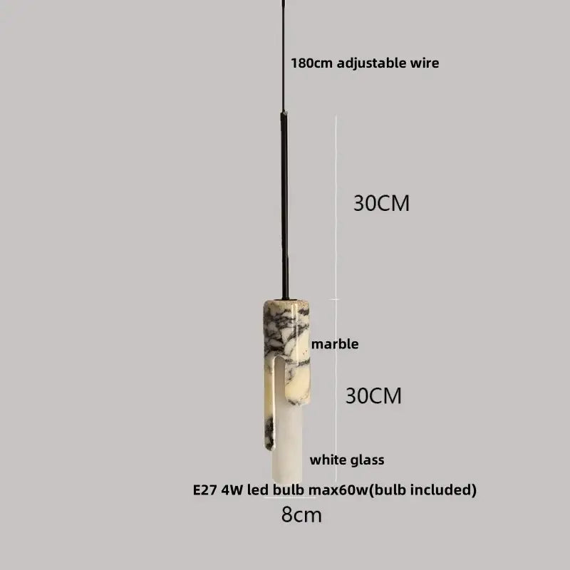 A modern pendant lamp with brown marble top featuring black beige veining and white glass cylinder for dining room decorbites bulgari stone led