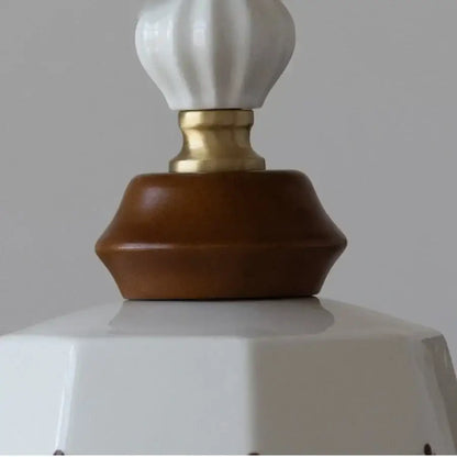 Modern white ceramic pendant light with gold-toned metal base and brown wooden accent for dining room decorbites copper wood decor