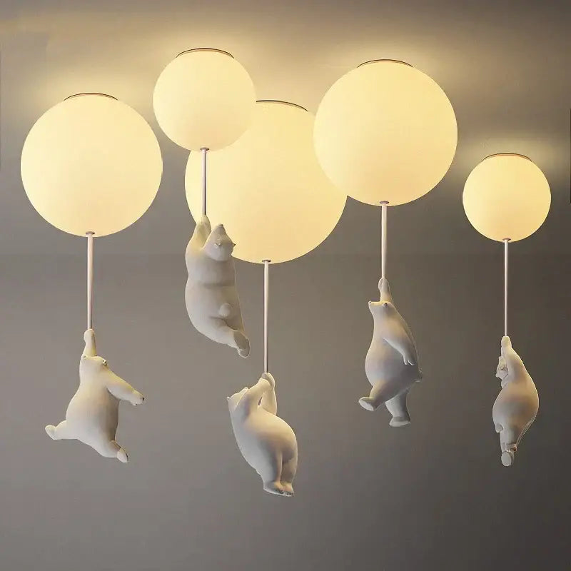 Modern white ceramic bear led ceiling light featuring polar bear figurines with frosted glass globe lights for kids bedroom