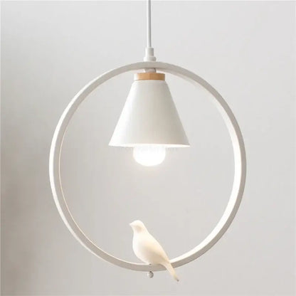 Modern white ceramic bird iron ring pendant light featuring a circular frame and small bird figurine for bedroom decor