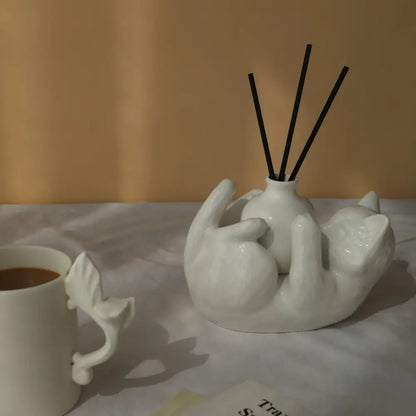 Modern white ceramic cat cartoon vase reed diffuser base with black reed sticks for living room decorbites cat cartoon
