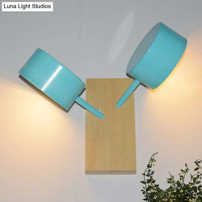 Modern white ceramic double drum wall sconce with turquoise ceramic saucepan-style shades on wooden base 110v-120v