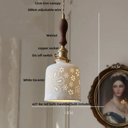Modern white ceramic flower pendant lamp with floral cutouts, walnut handle, and brass accents for kitchen led lighting