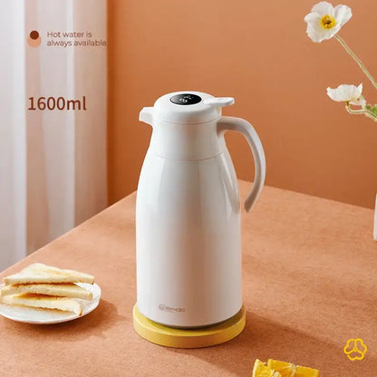 Modern white ceramic decorbites insulation kettle with digital display ergonomic handle on yellow base