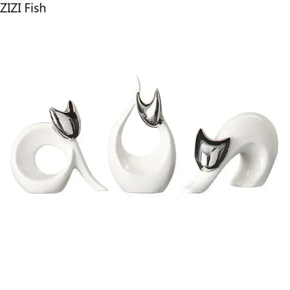 Set of three modern white ceramic kitten statues with polished silver metallic ears for living room decor