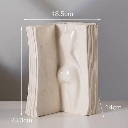 Modern cream-colored ceramic man face vase shaped like an open book with sculpted female figure for living room decorbites ceramic man decor