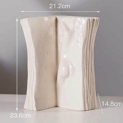 Modern cream-colored ceramic man face vase with textured ridges for living room decor and storage by decorbites ceramic man