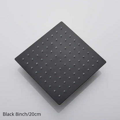 Modern black matte rainfall shower head with evenly spaced metallic nozzles for a sleek bathroom fixture