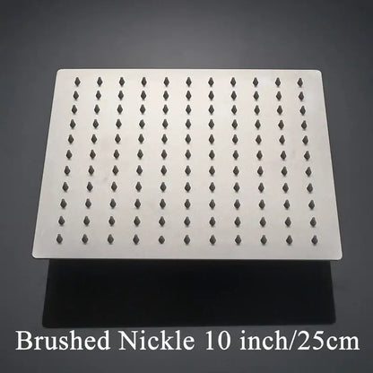 Modern white chrome brushed nickel square rainfall shower head with dark-tipped nozzles for an elegant bathroom fixture