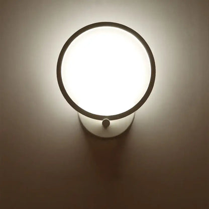 Modern white circle sconce light fixture with sleek black frame and soft white diffused light for bedroom 110v-120v 220v-240v