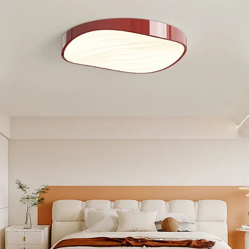 Modern white circular chandelier with red-accented oval ceiling light panel for dining room decorbites circular chandelier