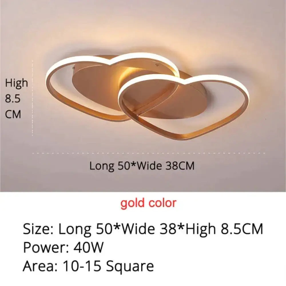 Gold-colored led pendant light with two interlocking hearts for modern white coffee bedroom lighting