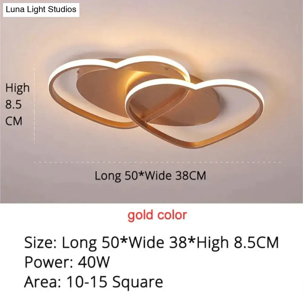 Gold-colored led pendant light with modern intertwined heart design for white coffee bedroom decor