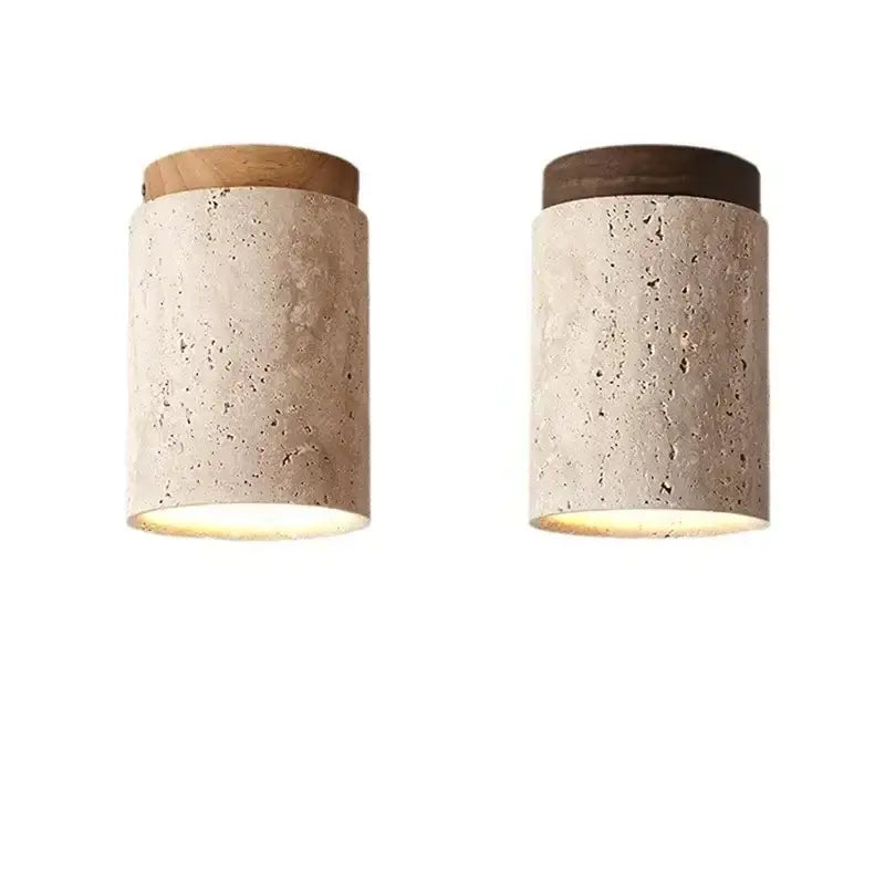 Modern white concrete pendant light with two cylindrical wall sconces in beige and brown for kitchen lighting area