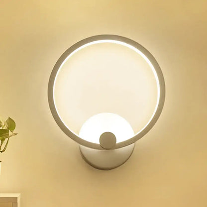Modern white curved led wall lamp with a sleek matte finish, illuminated ring, and central spherical bulb base light type