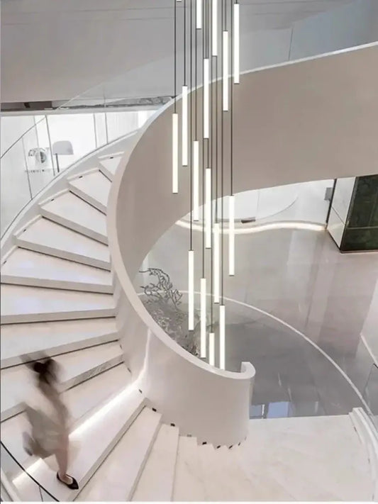 Modern white duplex loft led chandelier with sleek cylindrical tubes in a cascading stairway pendant light decorbites duplex loft